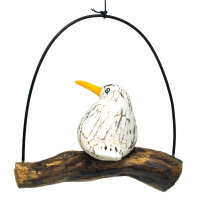 Wei&szlig;er Vogel aus Holz, kleine M&ouml;we auf Schaukel